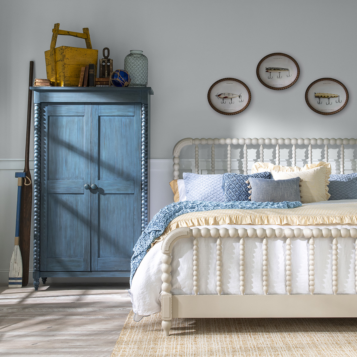 Country style end tables or nightstands in muted colors stacked in a triangle