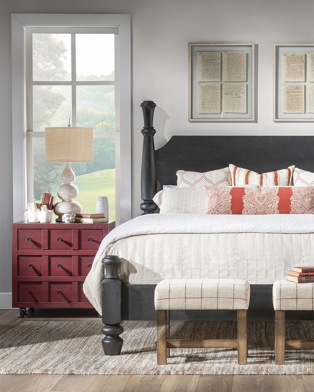 Black 4 poster bed with white linens