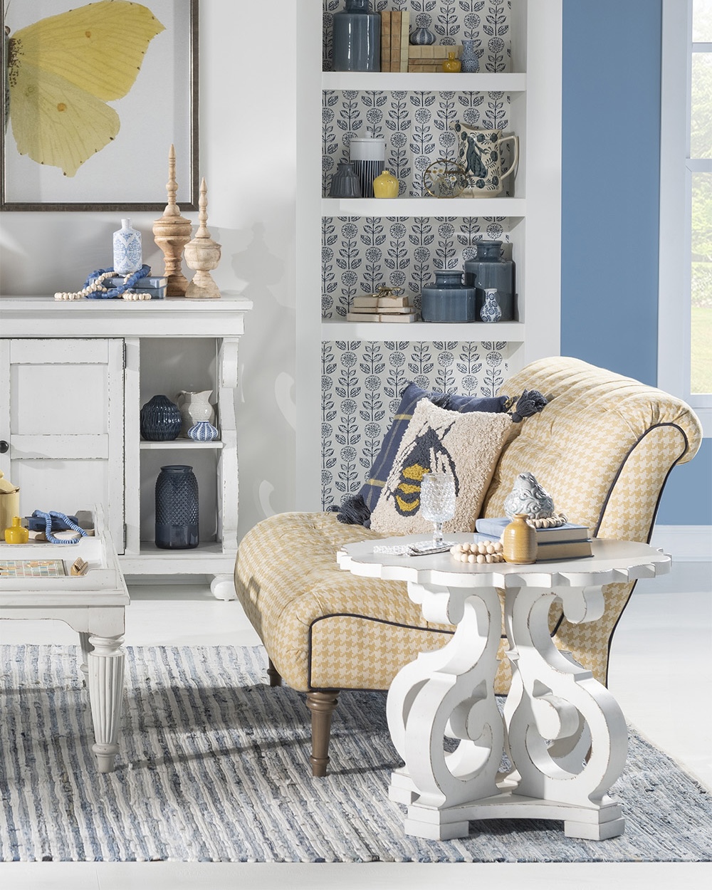 Cream livingroom with soft yellow rolled arm chair